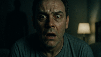 A cinematic image of a middle-aged man in bed looking shocked at a shadowy figure, representing the sudden realization of the unseen psychological root cause of performance anxiety.